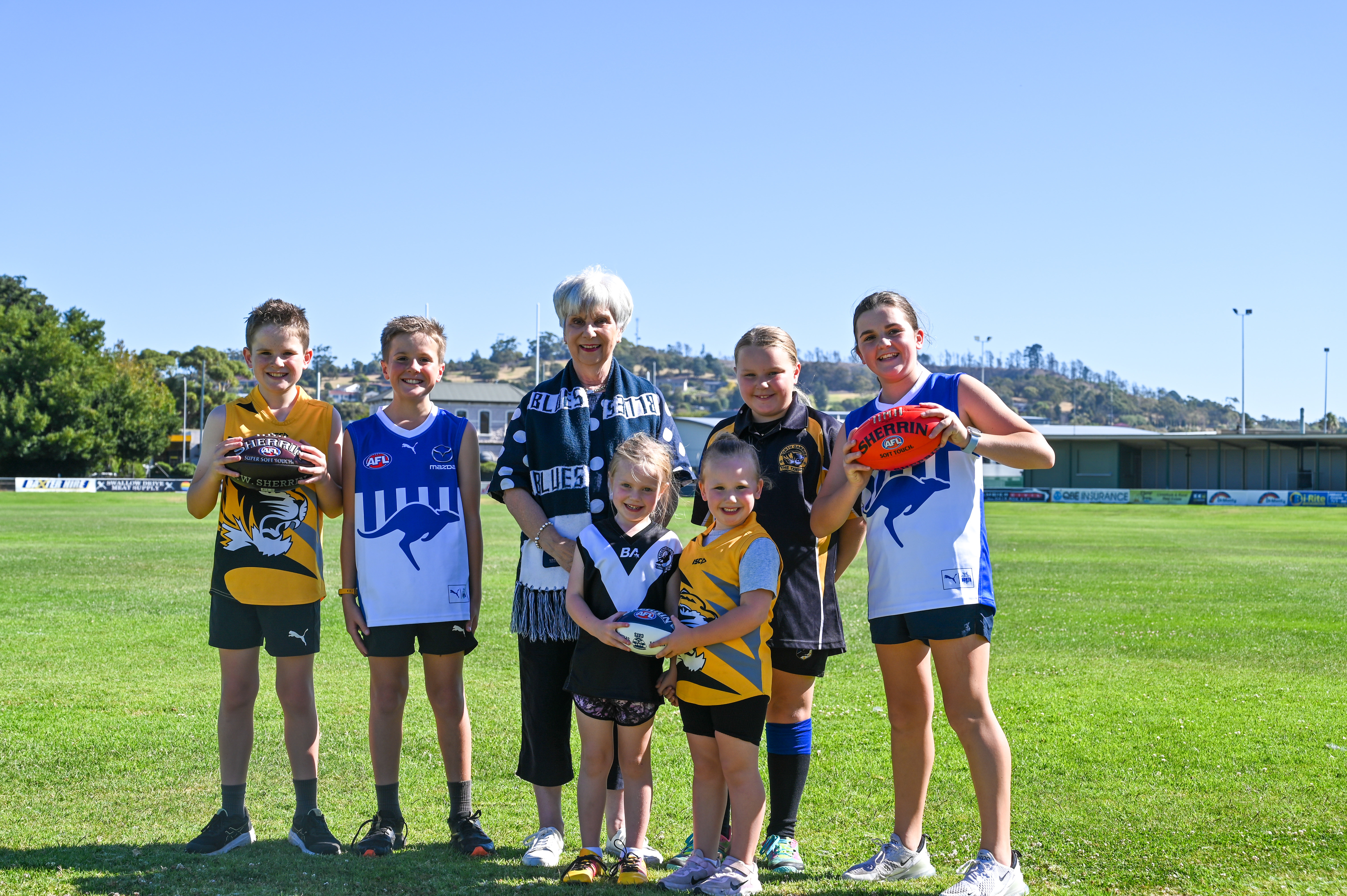 Children on oval in football gear