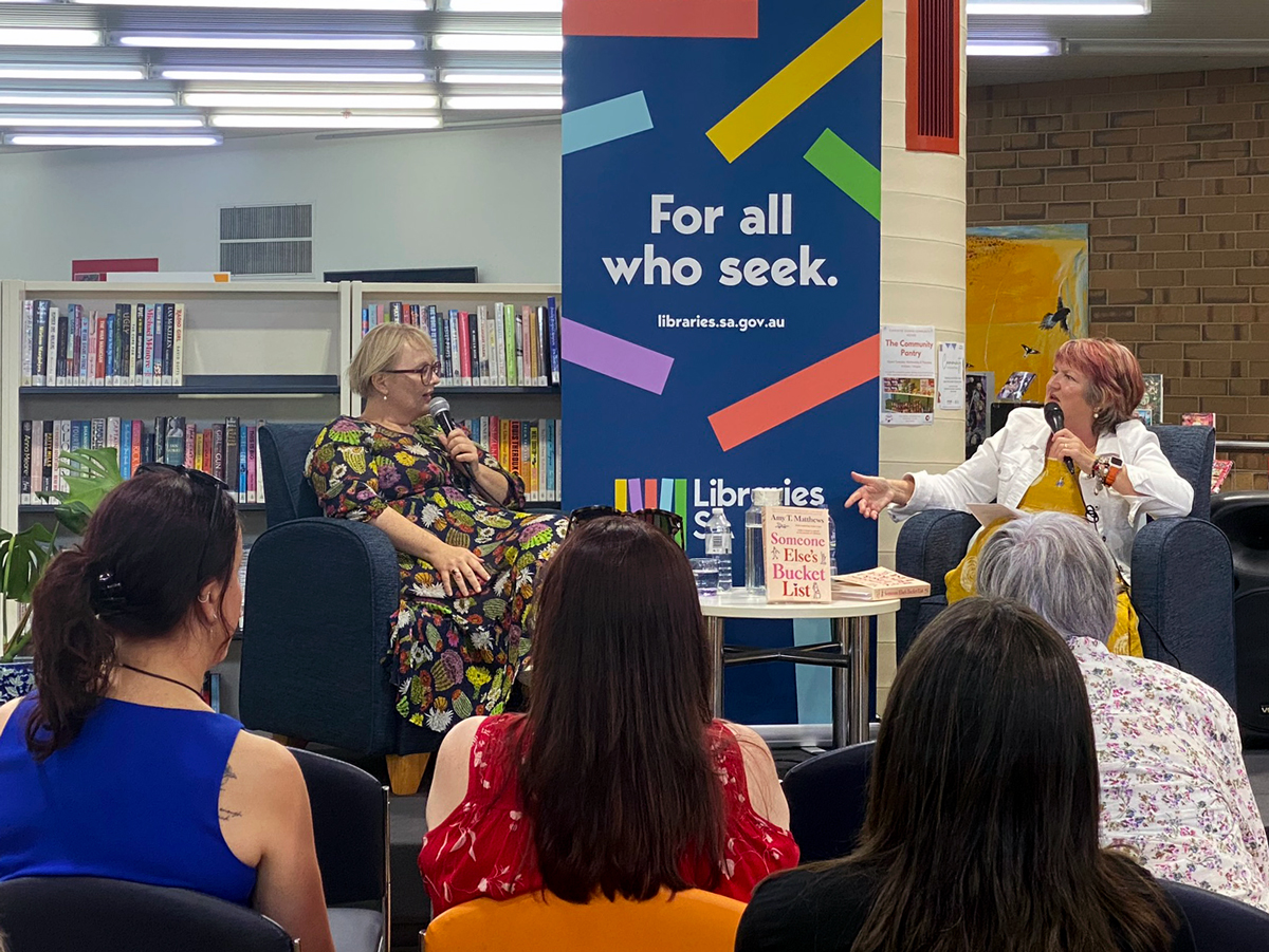 Two people talking at a Wordfest event